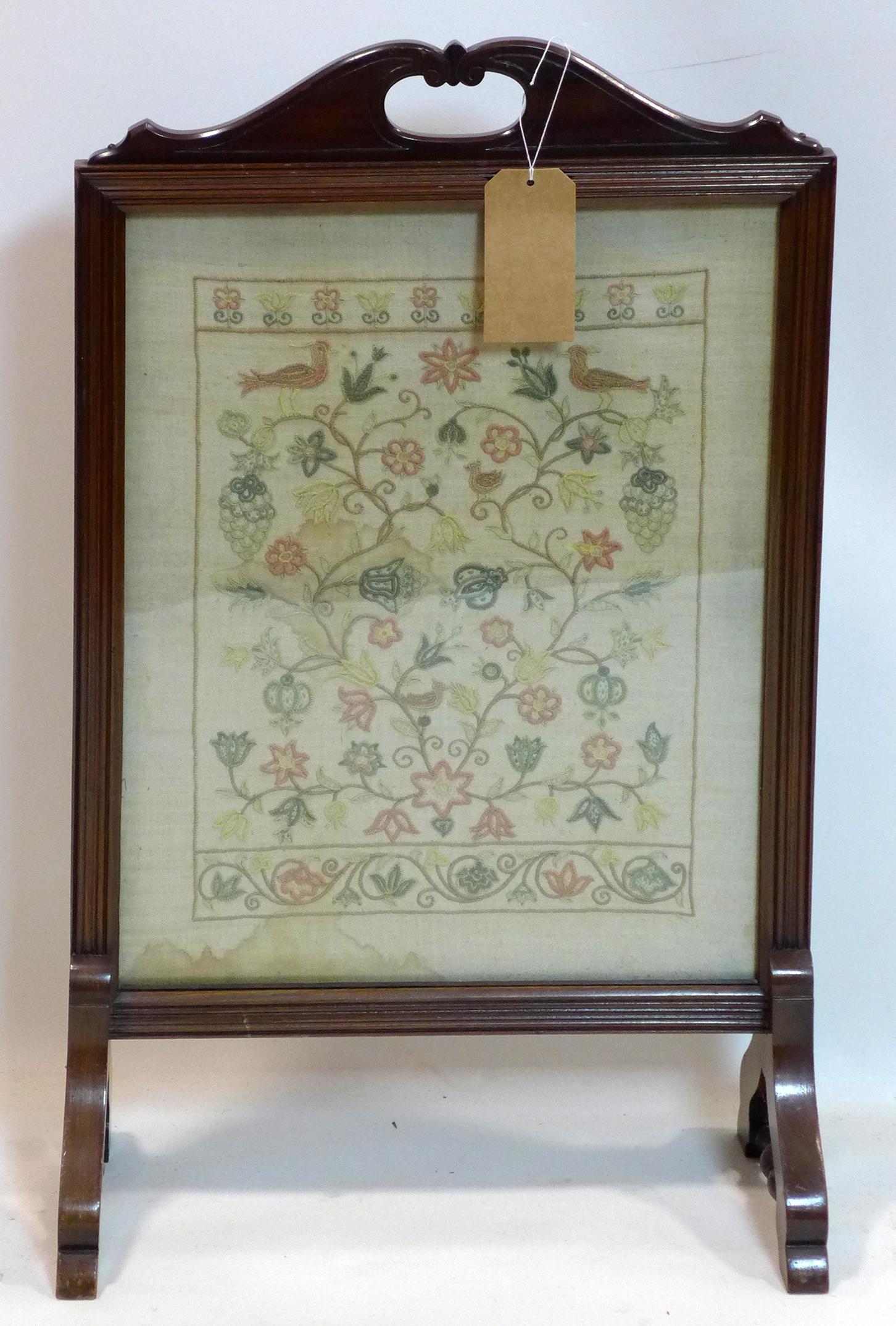 A late 19th century mahogany fire screen with embroidered panel, H.87 W.51 D.23cm