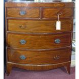A 19th century mahogany bow front chest of drawers, with boxwood inlay, raised on splayed feet, H.