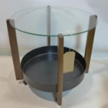 A 20th century circular glass top lamp table, H.48 W.54 D.54cm
