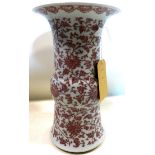 A 19th century, Chinese 'Yen-Yen' vase allover decorated in iron red floral motifs, H: 41cm