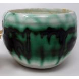 A late 19th century Chinese green and white drip and crackle glazed pot, H.10 D.13cm