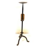 A late 19th century wrought iron pricket candlestick, knopped stem on outswept tripod feet, H.77cm