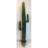 A faux cactus, in plastic pot, H.170cm