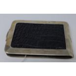 A Victorian silver and crocodile skin cheque book holder