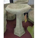 Two Art Nouveau style bird baths, with hexagonal font above spreading hexagonal bases decorated with
