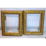 A pair of 20th century gilt wood picture frames with leaf border, 62 x 50cm