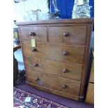 A Victorian figured walnut chest of drawers, raised on castors, H.114 W.100 D.47cm