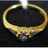 A 9ct gold and diamond ring