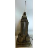 A Sarsaparilla Deco Designs 'Empire State Building' table lamp, H.48cm