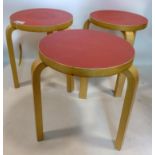 A set of three vintage Alvar Aalto stools for Artek
