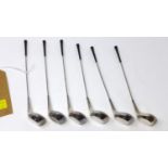 A set of six Danish silver plated cocktail sticks in the form of golf clubs by Frigast