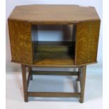 An Art Deco oak 2 tier book table, H.70 W.61 D.37cm