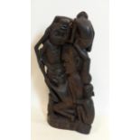 A 20th century Makonde hardwood carving, H.57cm