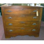 An early 20th century Cherry wood chest of drawers, with carved acorn handles, H.97 W.116 D.52cm