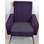 A mid 20th century purple velour easy chair, raised on tapered legs