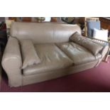 An Italian Brown leather sofa by Baxter, with vanity box, H.75 W.225 D.113cm