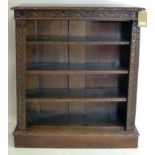 A Victorian carved oak open bookcase with adjustable shelves, H.115 W.91 D.32cm