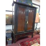 A late 19th century Chinese black lacquered wedding cabinet, H.203 W.148 D.60cm