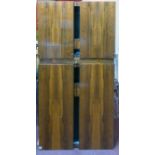 A 20th century Danish exotic hardwood wall hanging drinks cabinet, inset with miniature tiles,