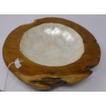 A wooden bowl with mother of pearl effect top, H.8 W.30 D.28cm