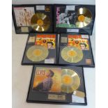 A collection of five Elvis Presley framed 24 carat gold plated limited edition records, to