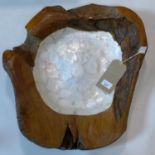 A wooden bowl with mother of pearl effect top, H.15 W.55 D.47cm