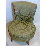 A mid 20th century bedroom chair with damask upholstery