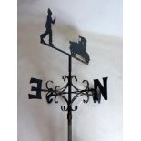 A 20th century cast iron weather vane on pole, H.267cm