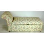 An Edwardian ottoman chaise long, recently upholstered in William Morris style fabric