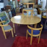 A 20th century Bernt Peterson model 310 dinig table and six chairs