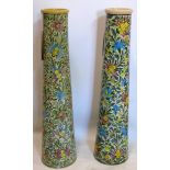 Two Persian Isfahan bamboo vases, of tapered form decorated with flowers, H.70cm