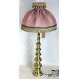 A 20th century brass table lamp with shade, H.124cm