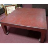 A large Chinese crackle glazed red lacquered coffee table, with wax seal mark to base, H.50 W.120