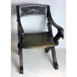 A 19th century Continental carved oak armchair