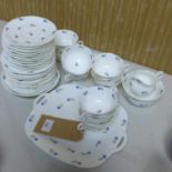 A set of 12 Coalport porcelain cups and saucers with other matching items