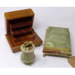 An onyx and gilt metal casket together with an onyx lighter and a musical cigarette box