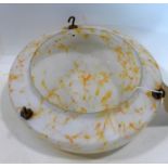 An Art Deco glass ceiling light shade, with mottled orange and yellow decoration, H.14cm Diameter