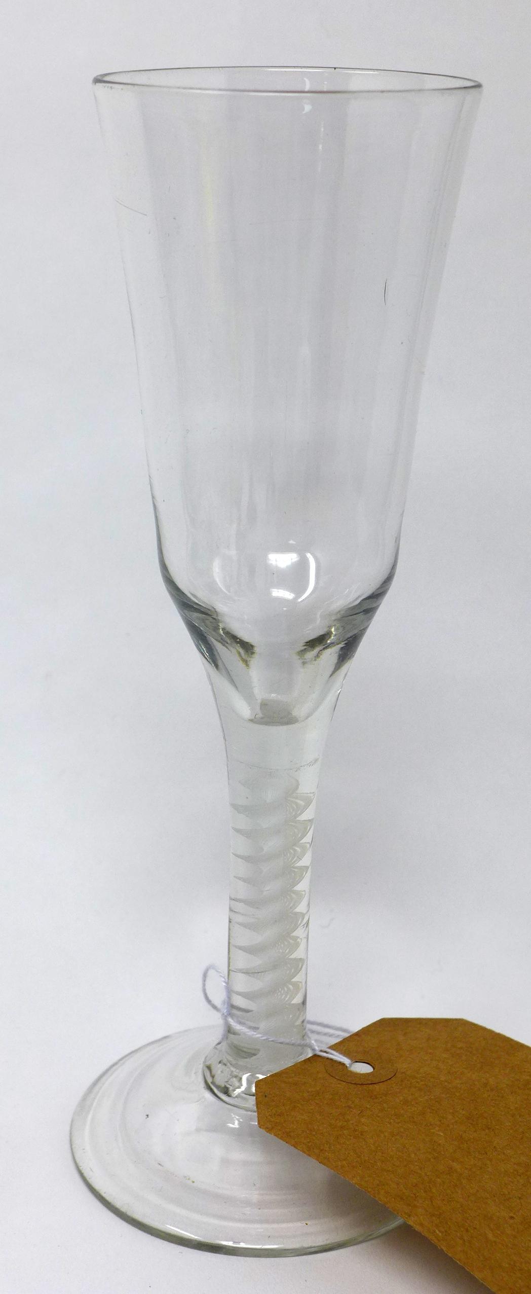 A Georgian champagne glass with white twist stem, on spreading base