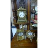 A 19th century brass mantle clock by Henry Marc together with a 19th century gilt metal cartel style