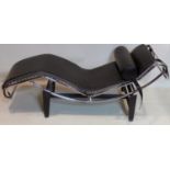 A Le Corbusier style chrome and black leather lounger