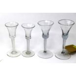 Four Georgian cordial glasses, with opaque twisted stems, H.19cm (tallest)