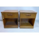 A pair of 20th century Meredew teak lamp tables, H.59 W.50 D.42cm