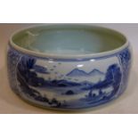 A Chinese, hand-painted blue and white porcelain brush washer decorated to the outside with 2