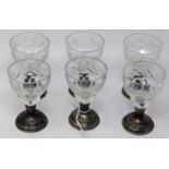 A set of six sherry glasses with silver feet