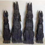 A set of four fibreglass models of hares, tallest H.71cm