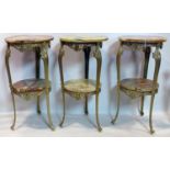 A set of three gilt metal and onyx two tier lamp tables, H.76 D.38cm