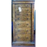 A Victorian burr walnut wellington chest, with seven graduating drawers, raised on stepped base, H.