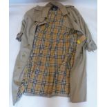 A men's long Burberry jacket