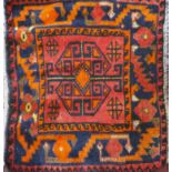 A small Persian rug, 76 x 66cm