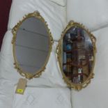 A pair of oval gilt metal mirrors, 66 x 39cm